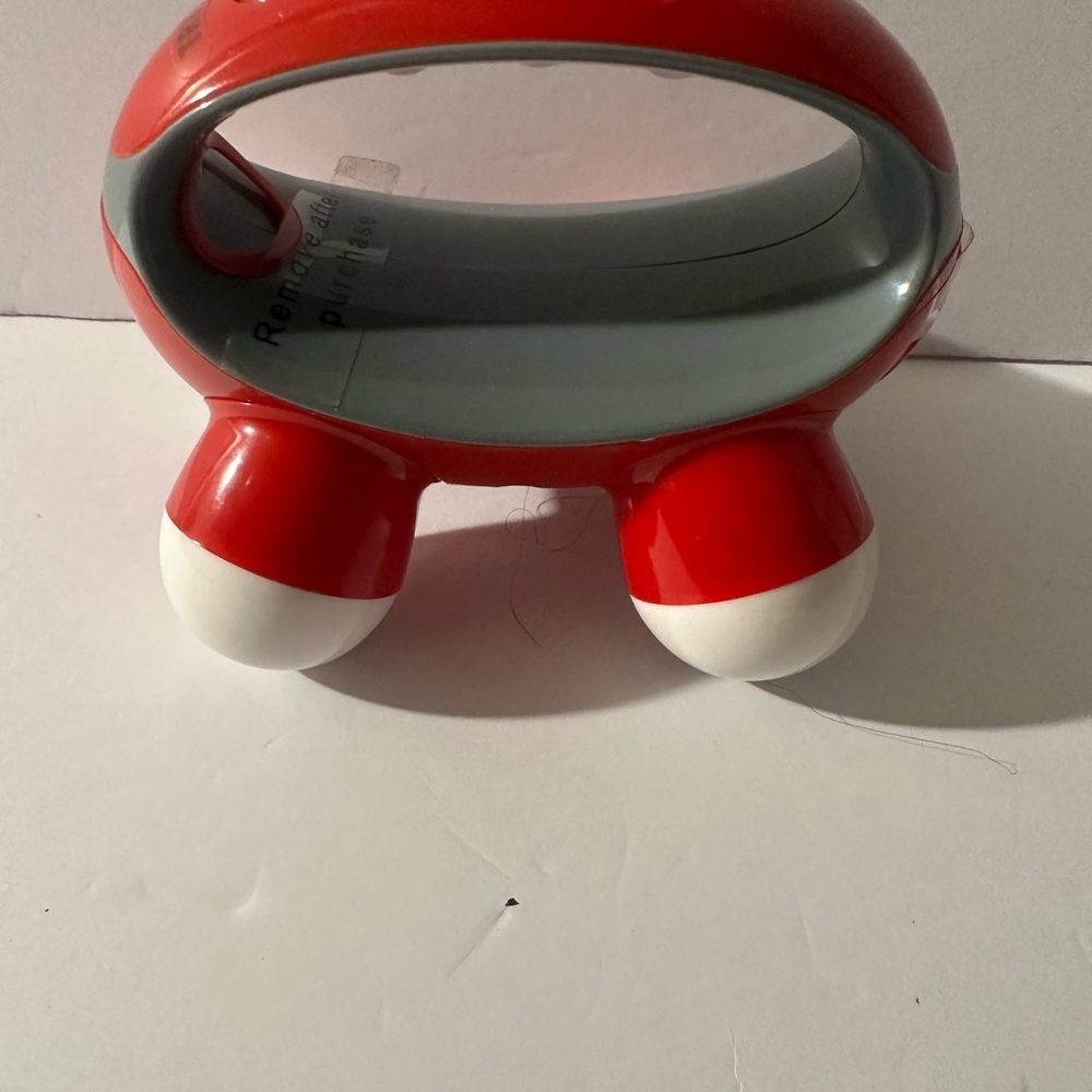 Red and Gray Handheld Massager